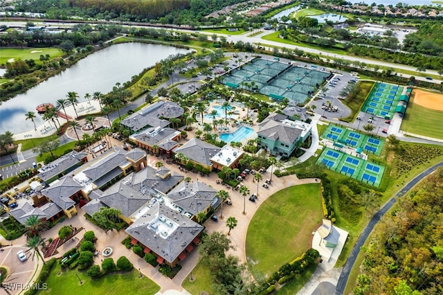 birds eye view of property with a water view