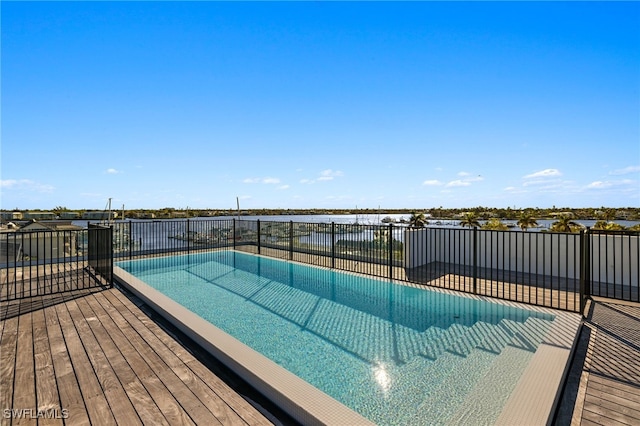 view of pool featuring a wooden deck