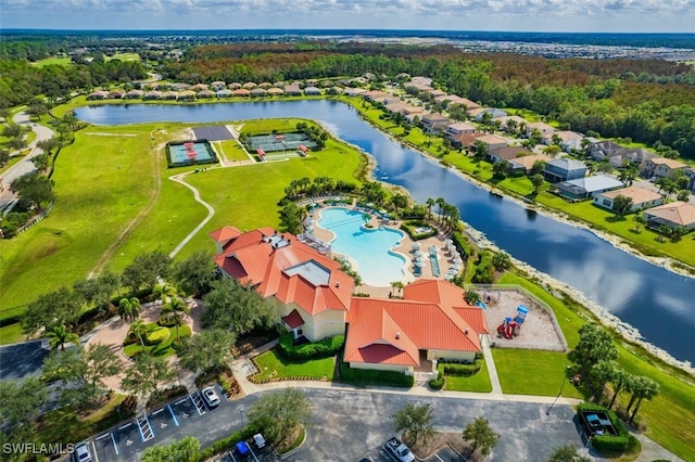 bird's eye view with a water view