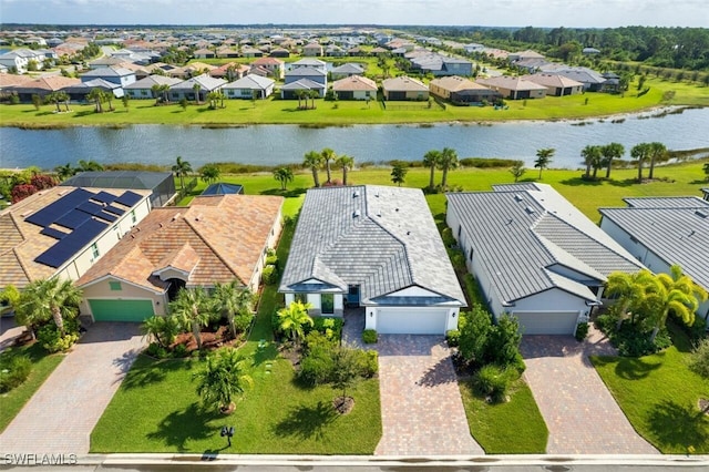 bird's eye view with a water view