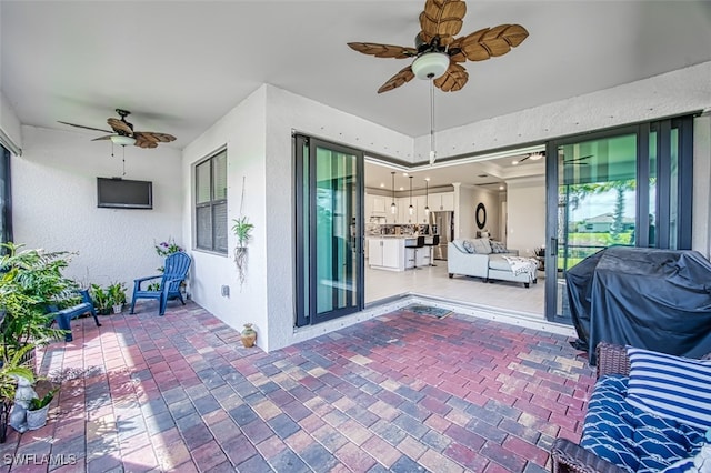 view of patio / terrace with ceiling fan