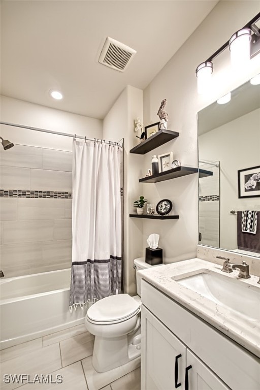 full bathroom featuring vanity, toilet, and shower / tub combo with curtain