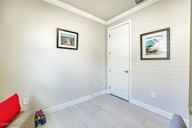 interior space with crown molding