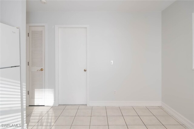 view of tiled spare room