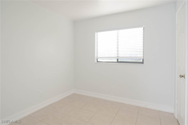 view of tiled spare room