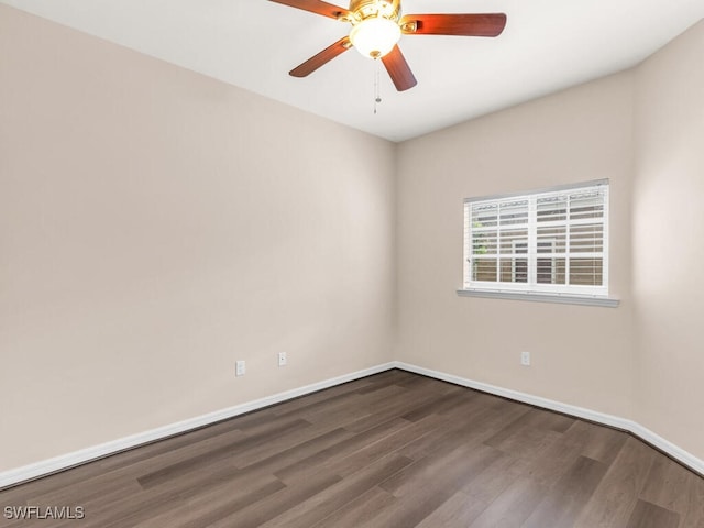 empty room featuring wood-type flooring and ceiling fan