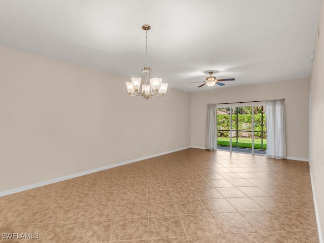 tiled empty room featuring ceiling fan with notable chandelier