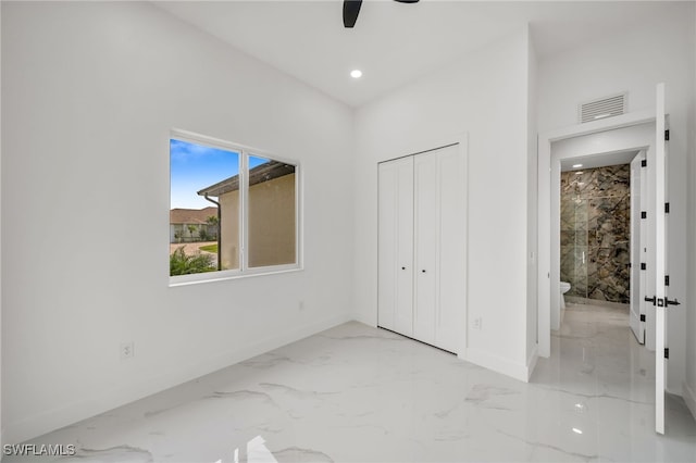 unfurnished bedroom with a closet and ceiling fan