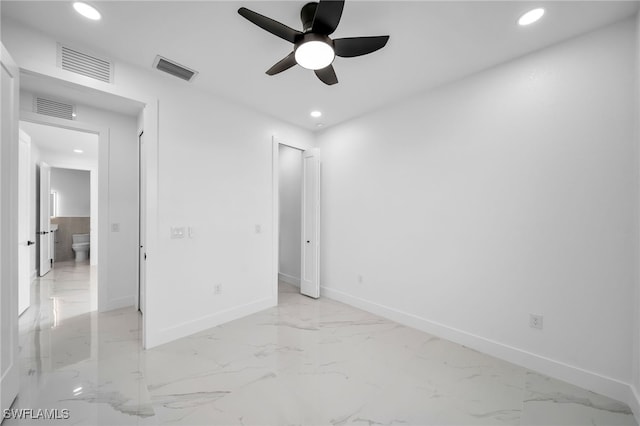 unfurnished bedroom featuring ceiling fan