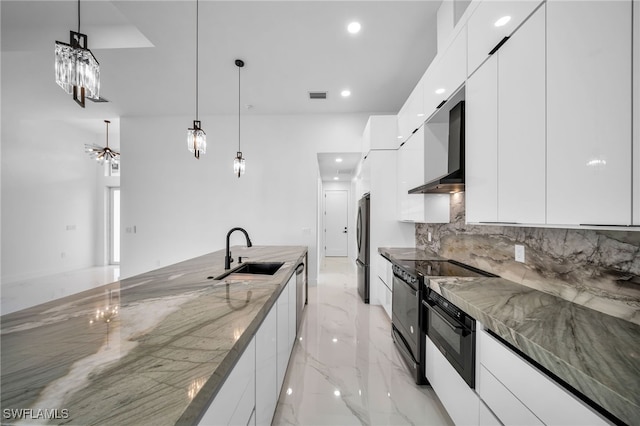 kitchen with black appliances, sink, decorative light fixtures, white cabinets, and exhaust hood