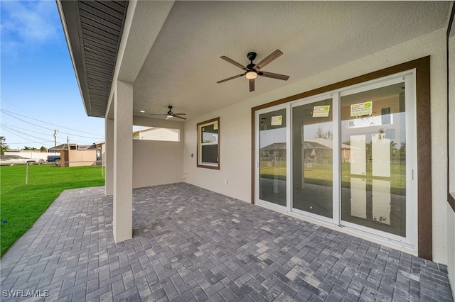 view of patio / terrace with ceiling fan