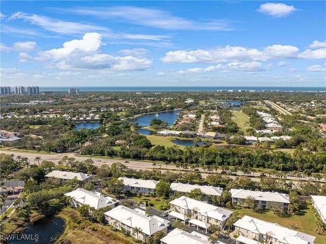 drone / aerial view with a water view