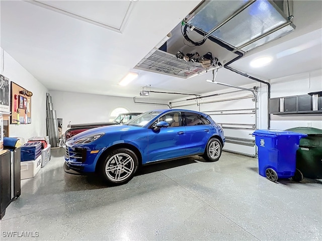 garage featuring a garage door opener