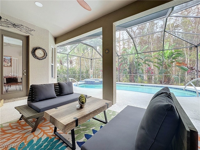 view of patio featuring glass enclosure, an outdoor hangout area, a pool with connected hot tub, and ceiling fan