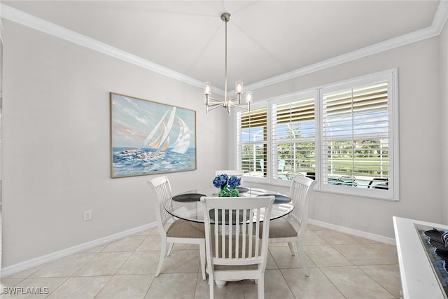 tiled dining space with an inviting chandelier and crown molding