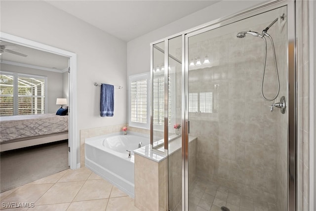 bathroom featuring ceiling fan, tile patterned floors, and plus walk in shower