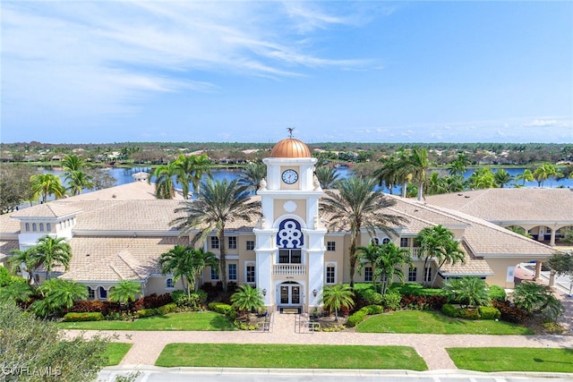 birds eye view of property with a water view