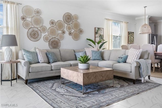 living room featuring crown molding