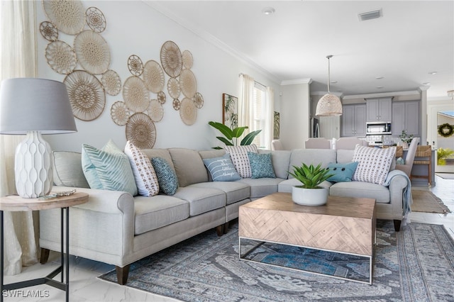 living room featuring ornamental molding