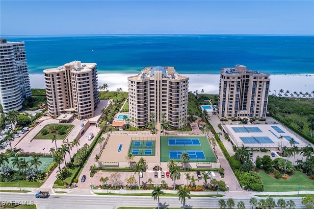 aerial view featuring a water view and a view of the beach