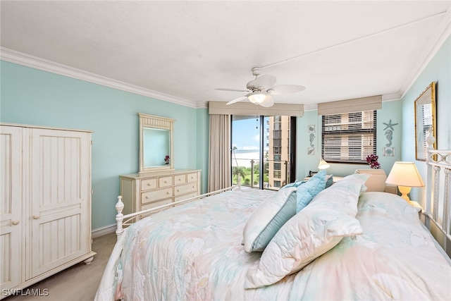 carpeted bedroom with ceiling fan, crown molding, and access to exterior