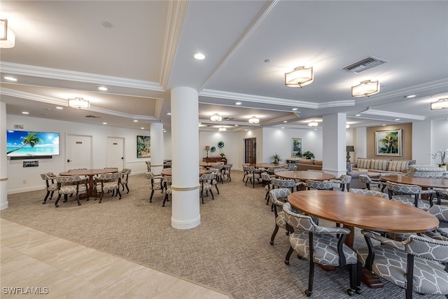 dining space with crown molding