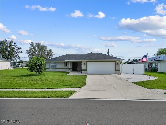 ranch-style house with a garage and a front lawn