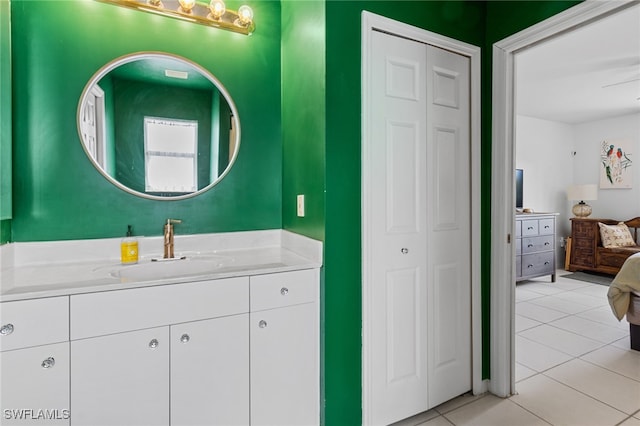 bathroom with vanity and tile patterned floors