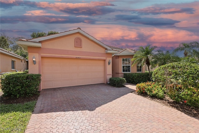 view of front of property featuring a garage