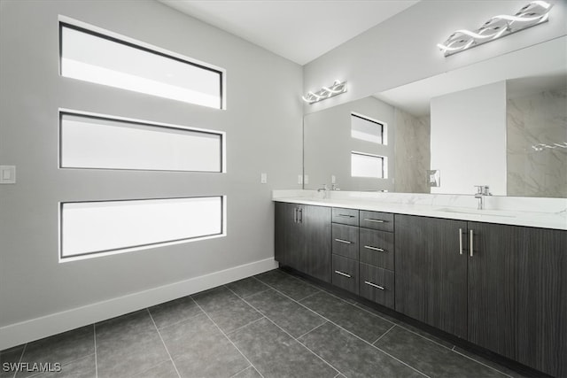 bathroom featuring vanity and tile patterned flooring