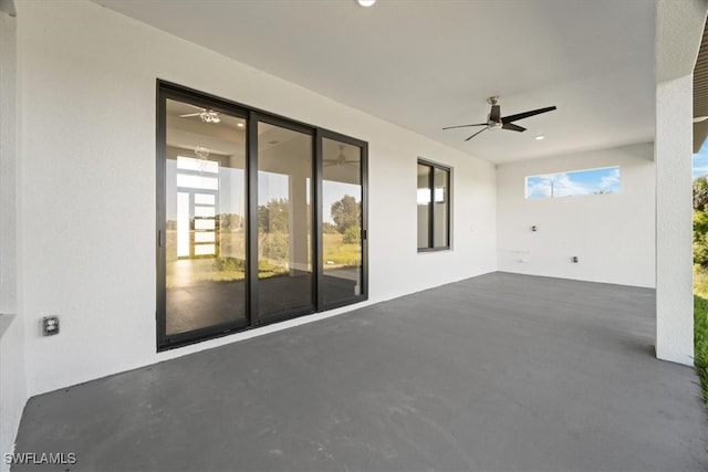 view of patio with ceiling fan