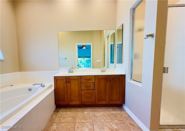 bathroom with vanity, shower with separate bathtub, and tile patterned flooring