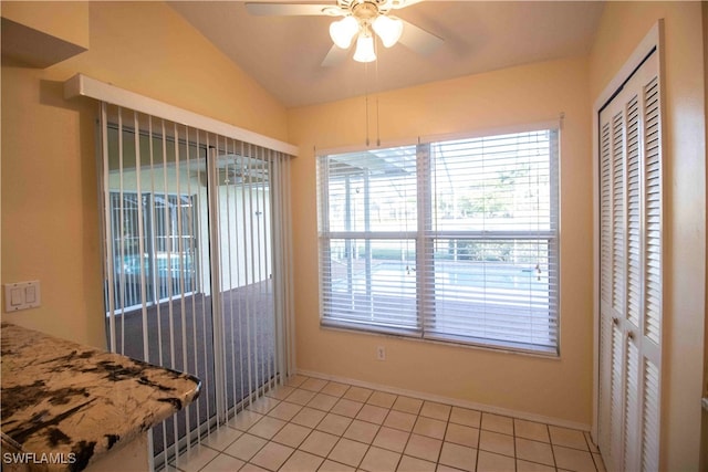 sunroom with lofted ceiling and ceiling fan