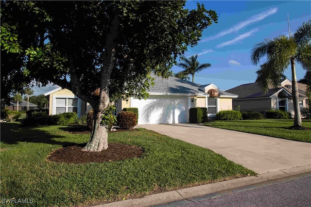 single story home featuring a front yard and a garage