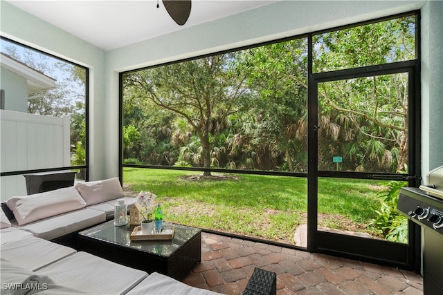 sunroom / solarium with a wealth of natural light