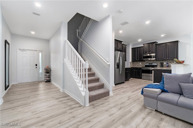 living room with light hardwood / wood-style floors