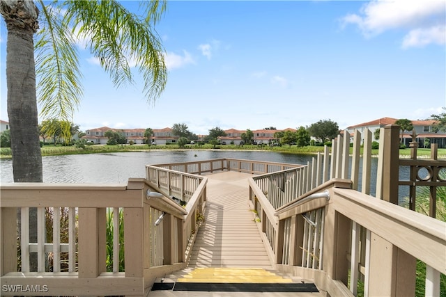 dock area with a water view