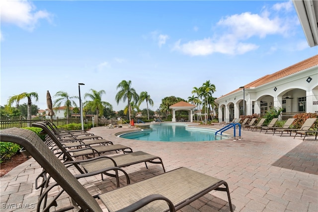 view of swimming pool featuring a patio area