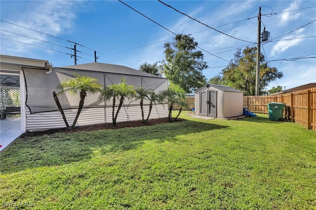 view of yard with a storage unit