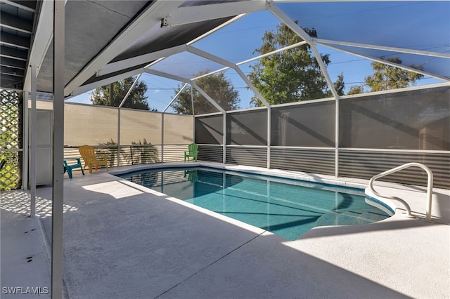 view of pool featuring a patio and a lanai