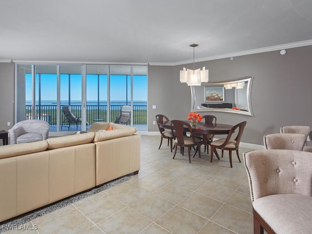 living room with a wall of windows, ornamental molding, a water view, and light tile patterned floors