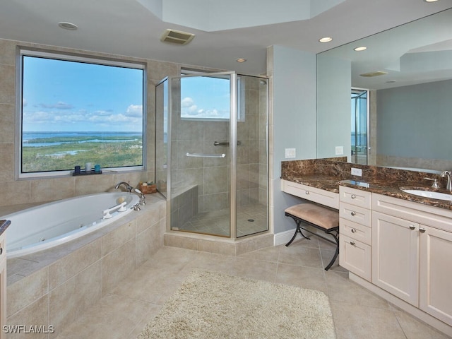 bathroom with vanity, shower with separate bathtub, tile patterned floors, and plenty of natural light