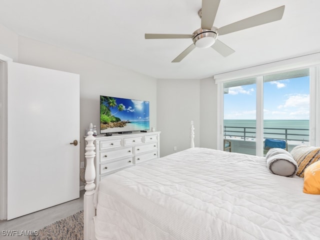 bedroom with access to exterior and ceiling fan