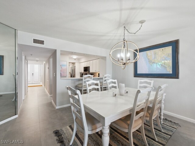 dining room featuring an inviting chandelier