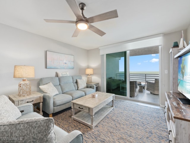 living room featuring ceiling fan