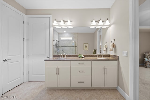 bathroom featuring vanity, tile patterned flooring, and walk in shower