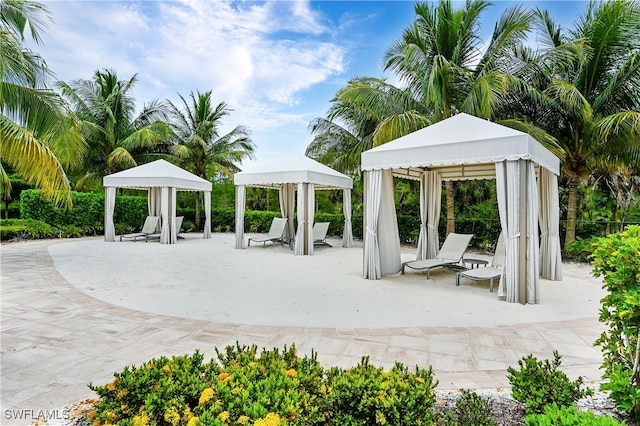 view of property's community featuring a gazebo and a patio area