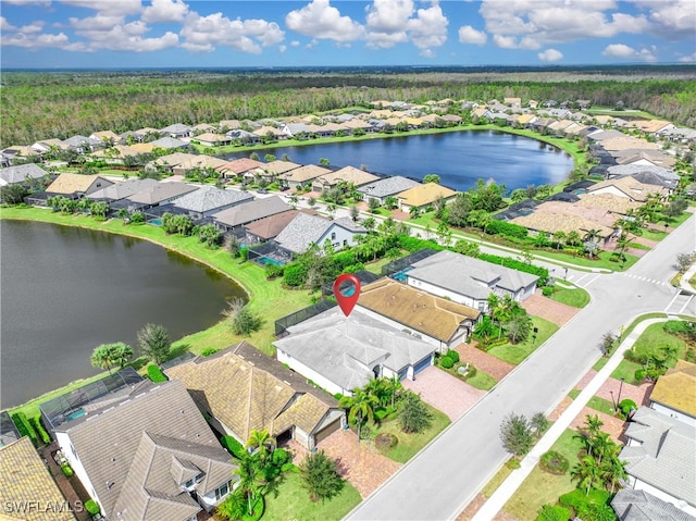 bird's eye view with a water view