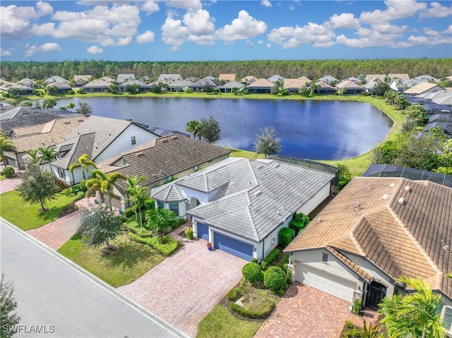 drone / aerial view featuring a water view