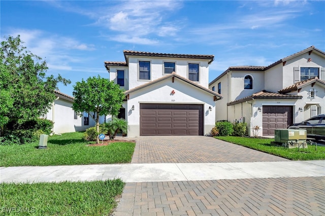 mediterranean / spanish-style home featuring a garage